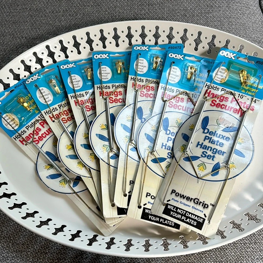 Set of 7 deluxe 10”-14” plate hanger set.
